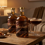 Two bottles of Chockers vodka with espresso martinis and nuts