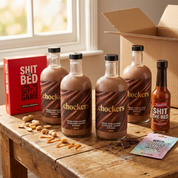 Case of four Chockers vodka bottles with game night gifts